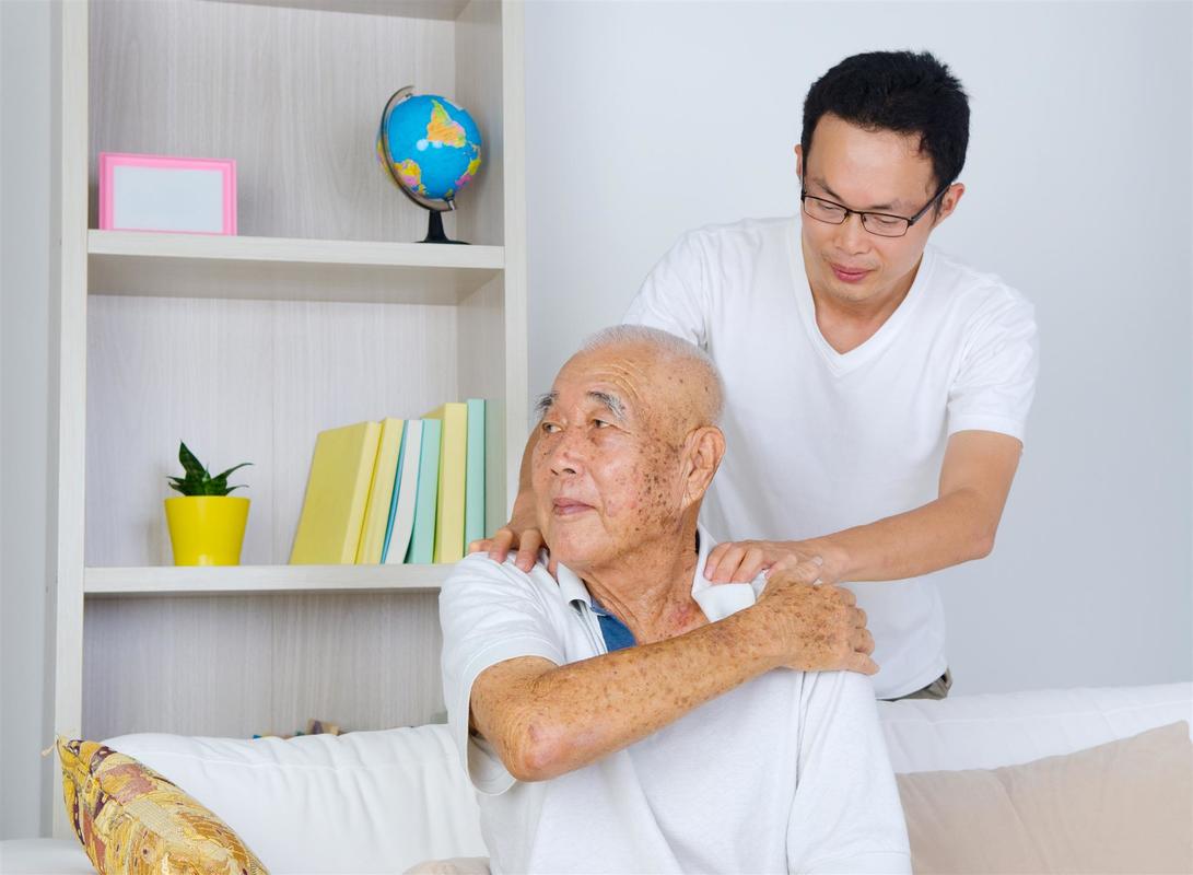 care worker massaging patient